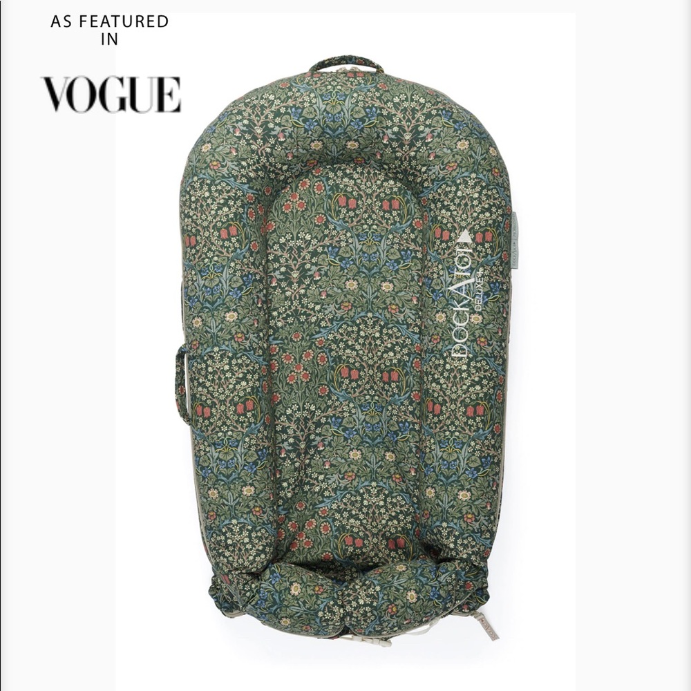 Dockatot Deluxe+ and three covers